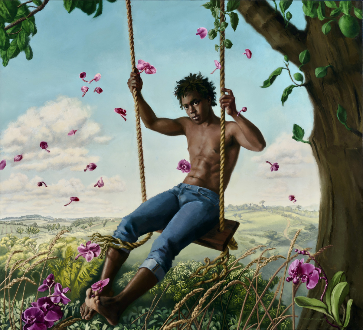 African American Man on a tree swing with flowers
