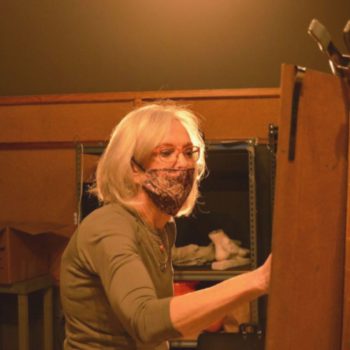 Eileen Dudley Painting at an Easel